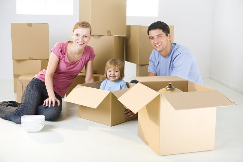 Packed boxes and furniture ready for a home removal in Clapham