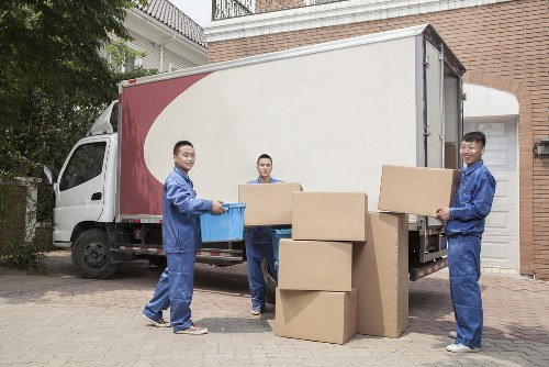 Movers loading a van on a Clapham residential street