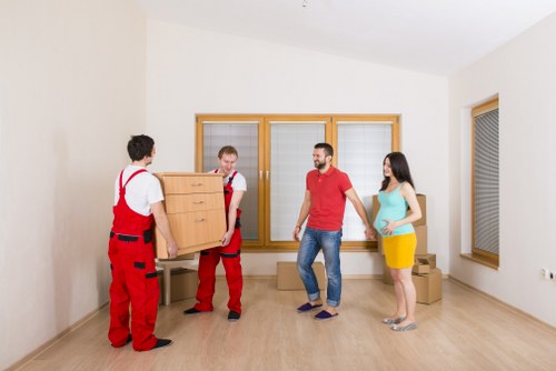 Driver and moving team preparing a van for a local Clapham move