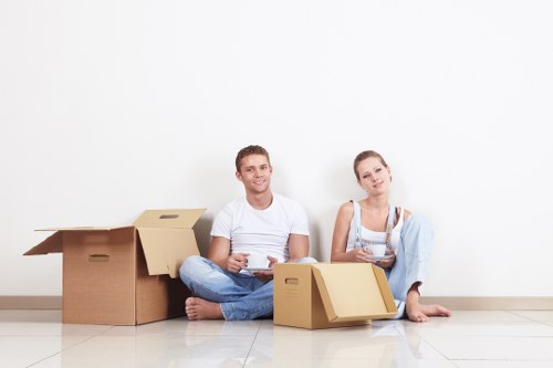 Unpacking boxes into a Clapham flat after moving day