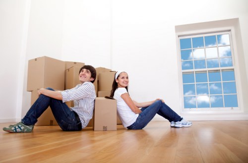 Packed boxes and labelled business items for local office removals